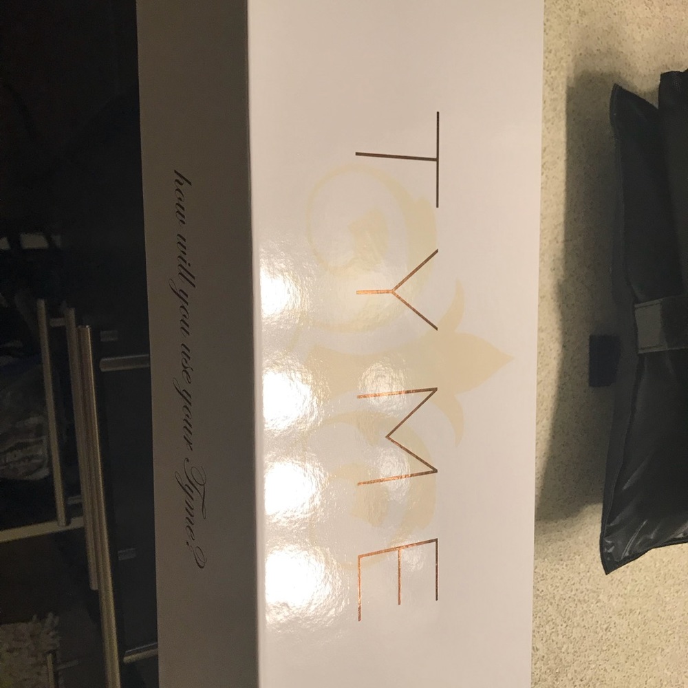 Gently used Tyme iron with case